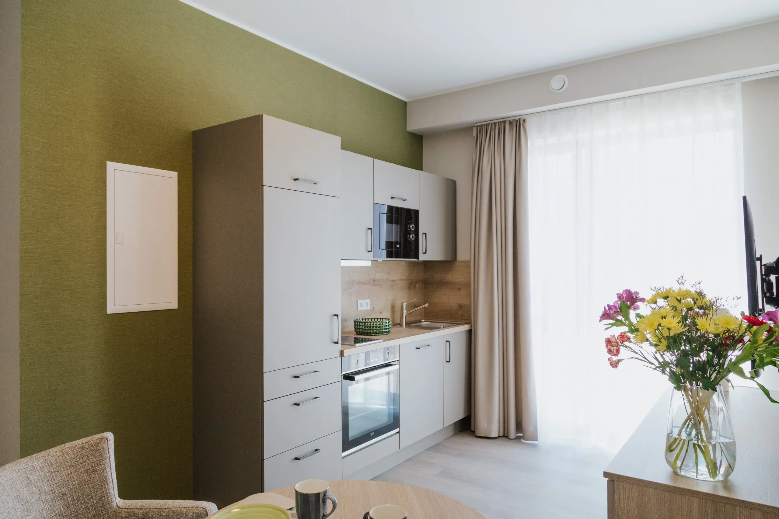 Betreutes Wohnen mit eigener Küchenzeile und Essbereich